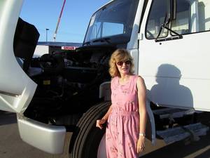 Nadine about to get under the hood of a BIG truck