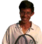 My tennis teacher, Gustavo. It seems like my side of the court is much larger than his side, even when we switch. 