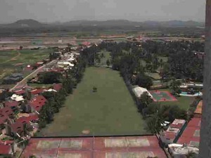 The driving range, and the mountains in the background